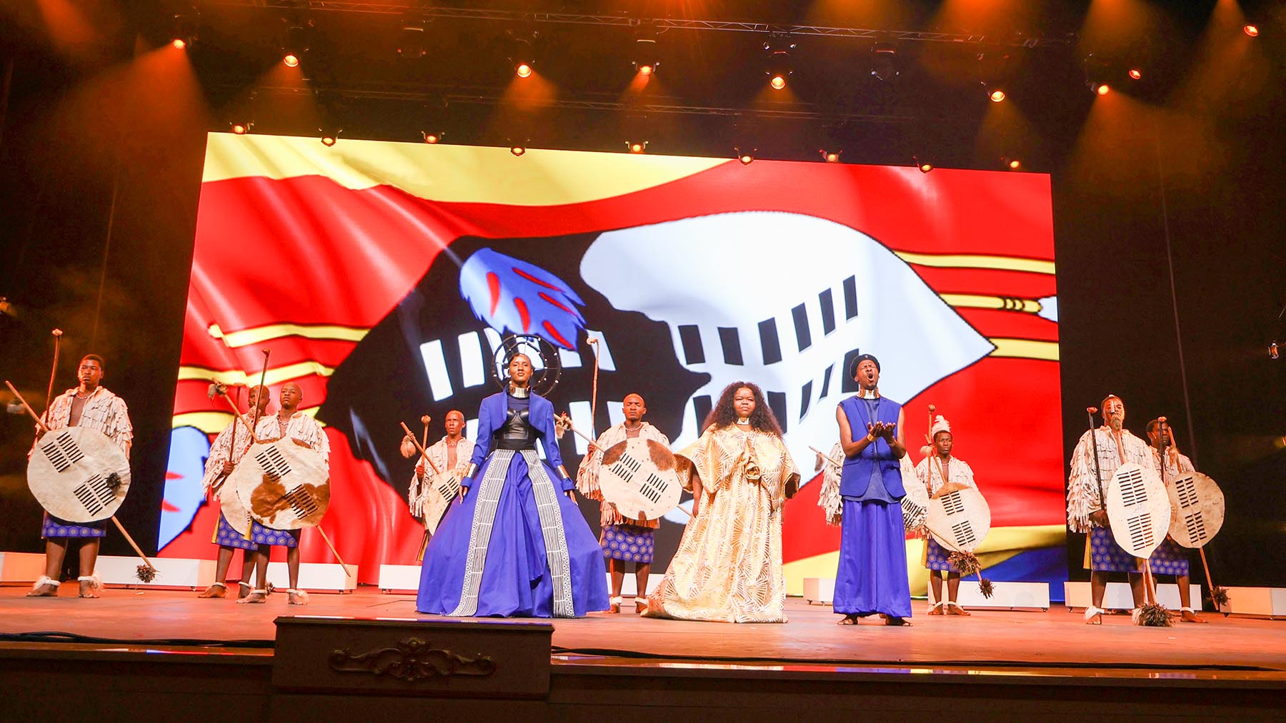 A local arts group performing for His Majesty King Mswati III and his guests in the theatre inside the ICC. 